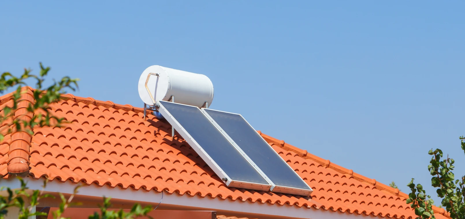 Solar panels on red tiled roof